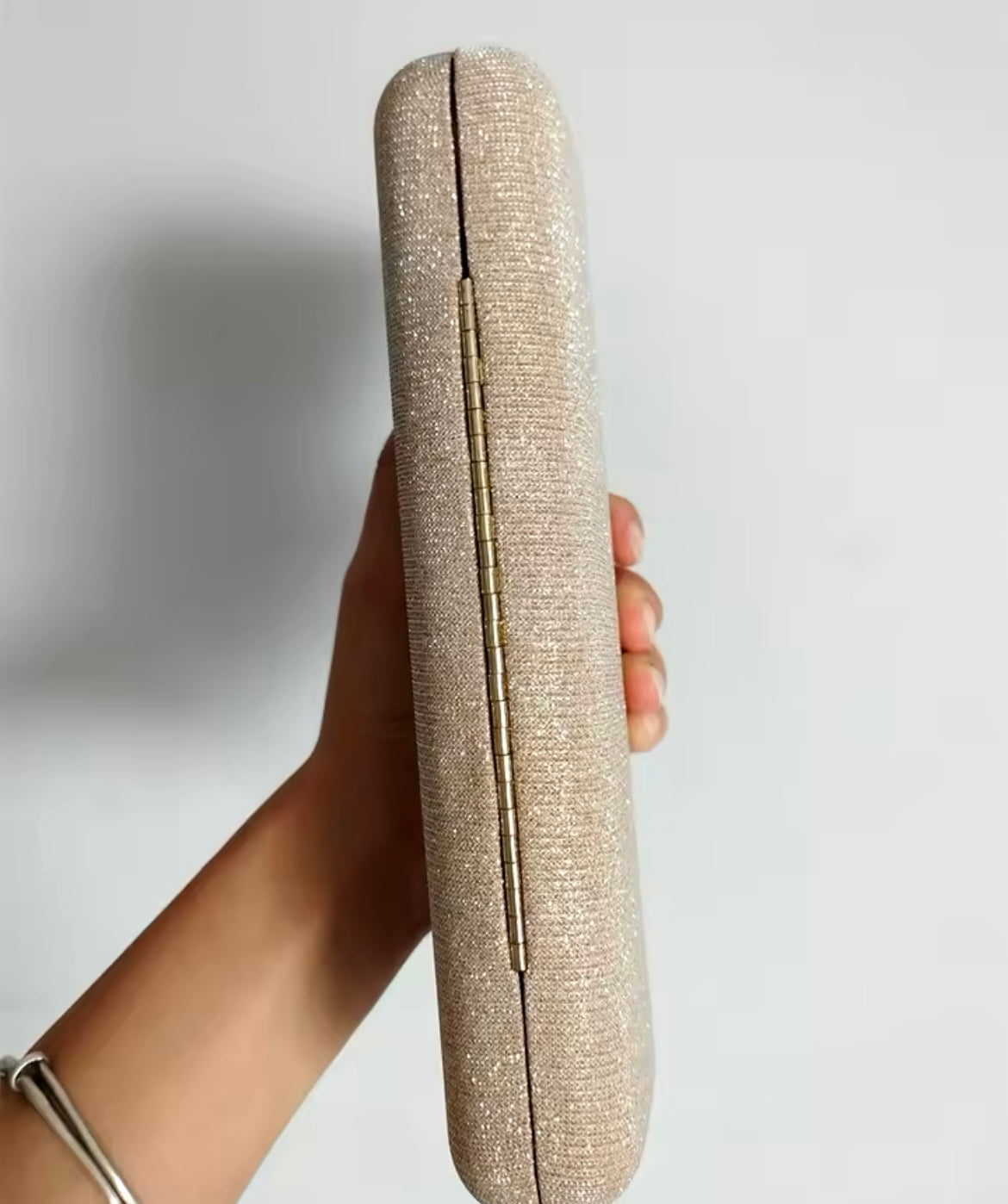 Rosemary golden baguette clutch with click braid