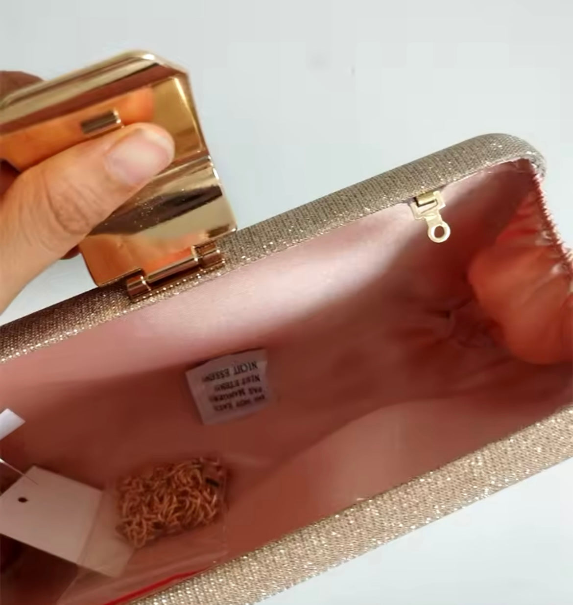 Rosemary golden baguette clutch with click braid