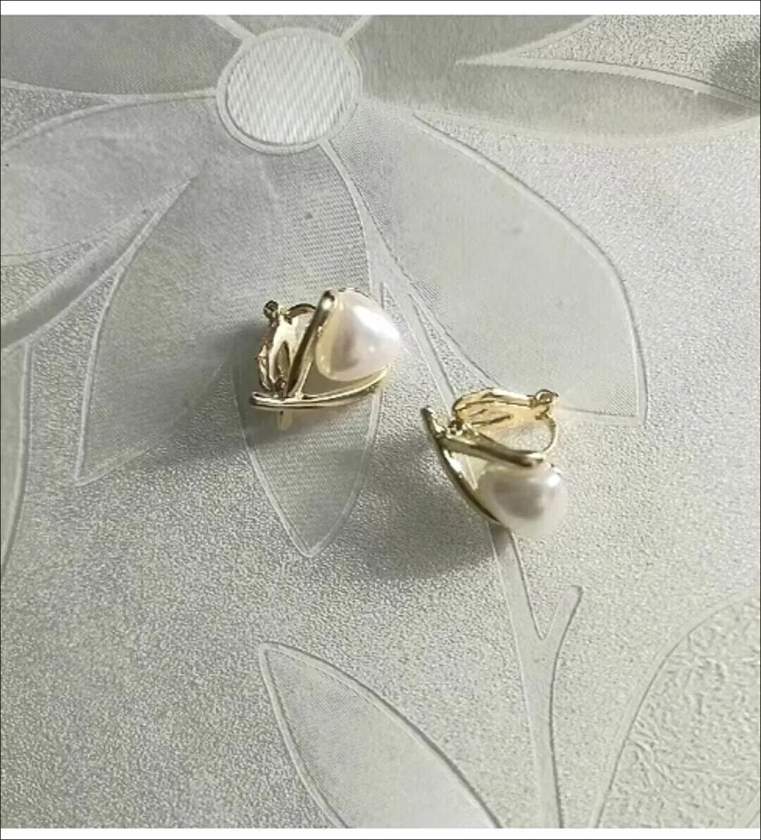 CLIP golden Geneva earrings