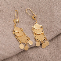Boucle d'oreille pôle