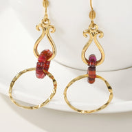 Boucle d'oreille marron