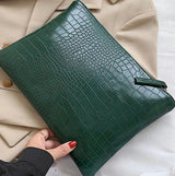 Pochette Pia en crocodile, 6 coloris