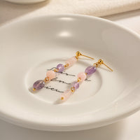 boucle d'oreille lilas