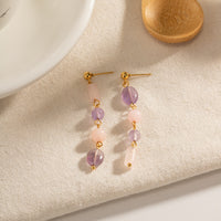 boucle d'oreille lilas